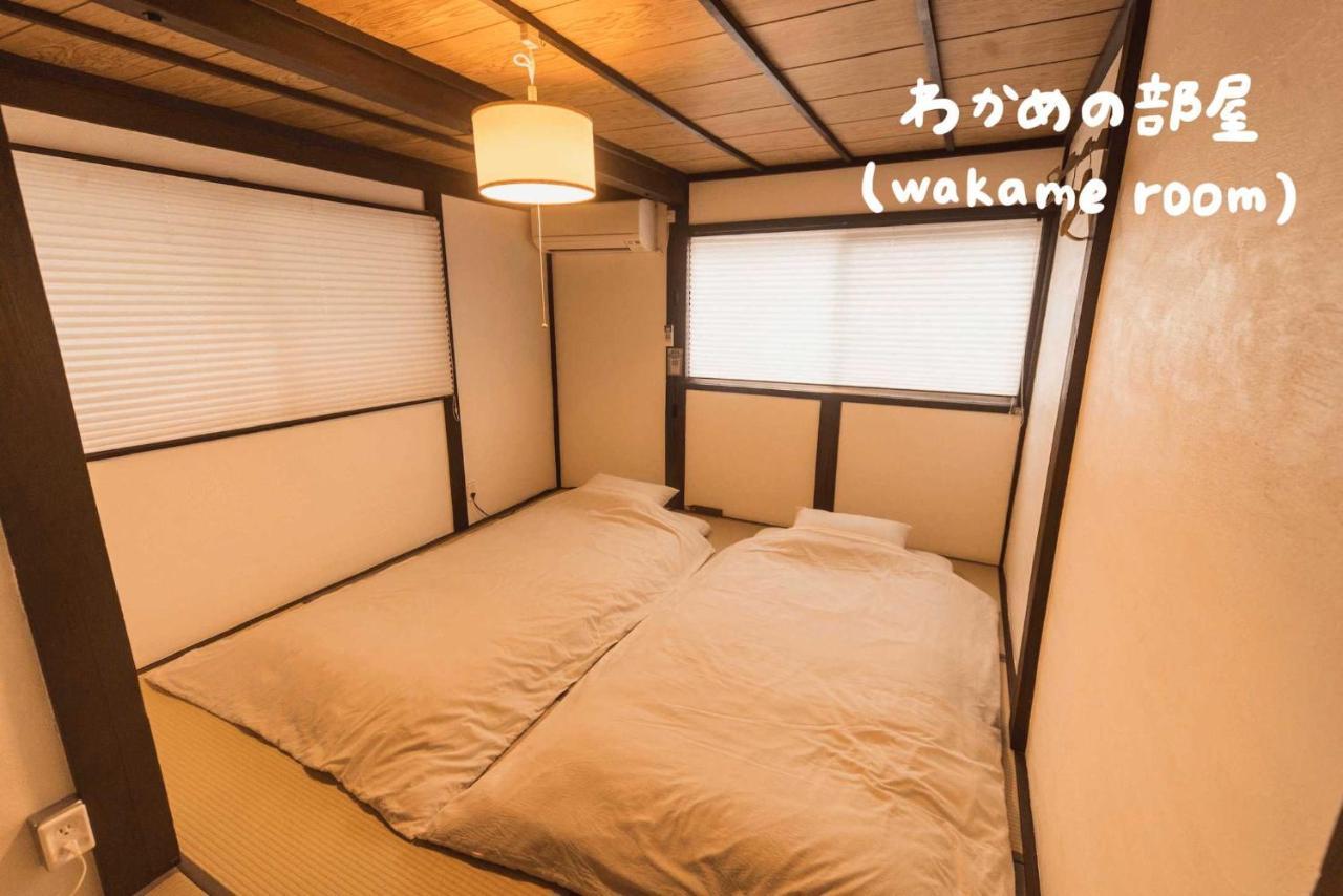 Book & Guesthouse Hitotomaru Toyooka  Buitenkant foto